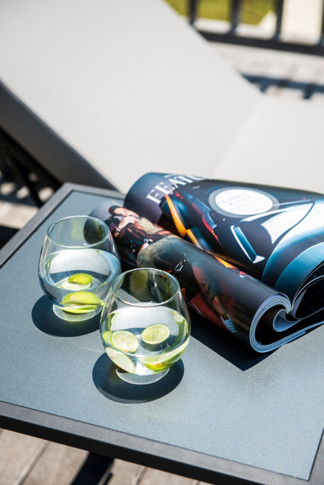 Horizon side table with drinks and magazine