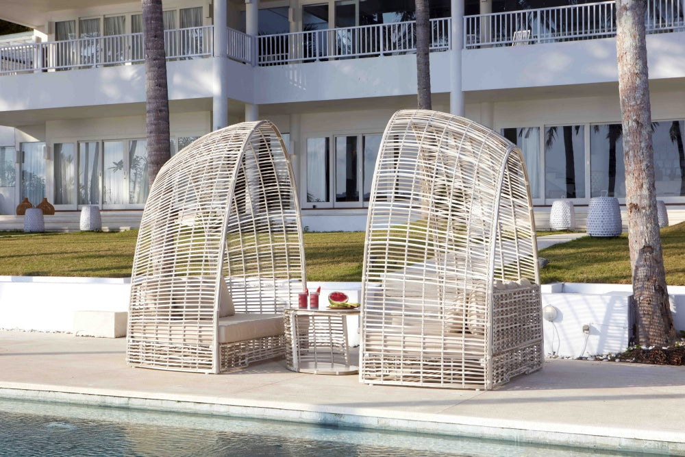 Two Surabaya Off-White Mushroom Daybeds Facing each other with table in the middle