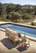 Noa Love Seat and side table by pool